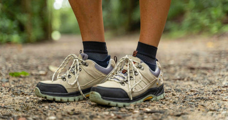 Person wearing the OrthoSleeve Plantar Fasciitis Sleeves while hiking