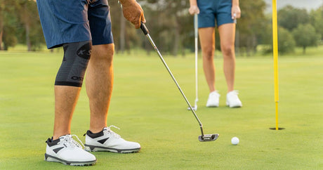 Man wearing the OrthoSleeve KS7 Knee Sleeve while golfing