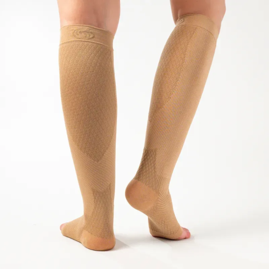 Back view of the OrthoSleeve FS6+ Leg Sleeves in Tan