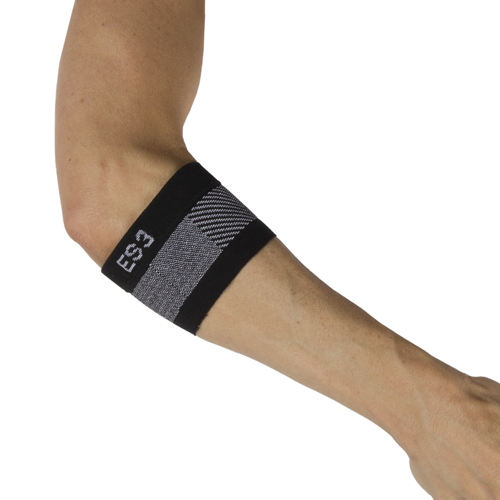 Person wearing the compression elbow brace