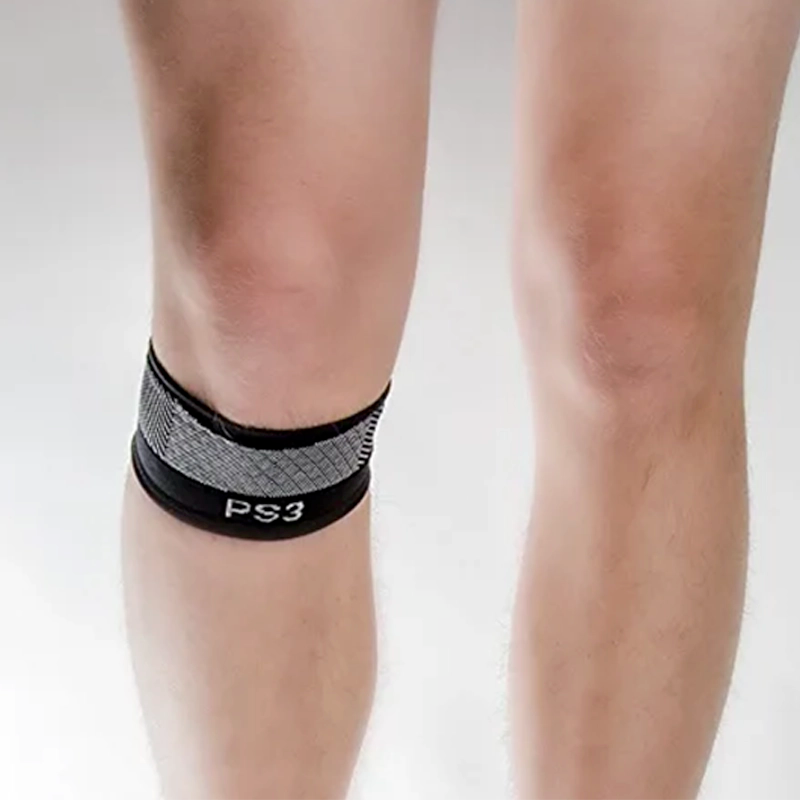 Image of the Patella compression bracing sleeve on a man's leg