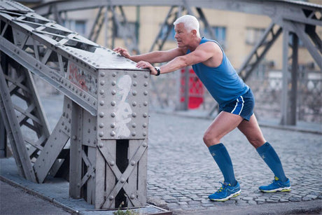 A man working out and wearing our compression socks