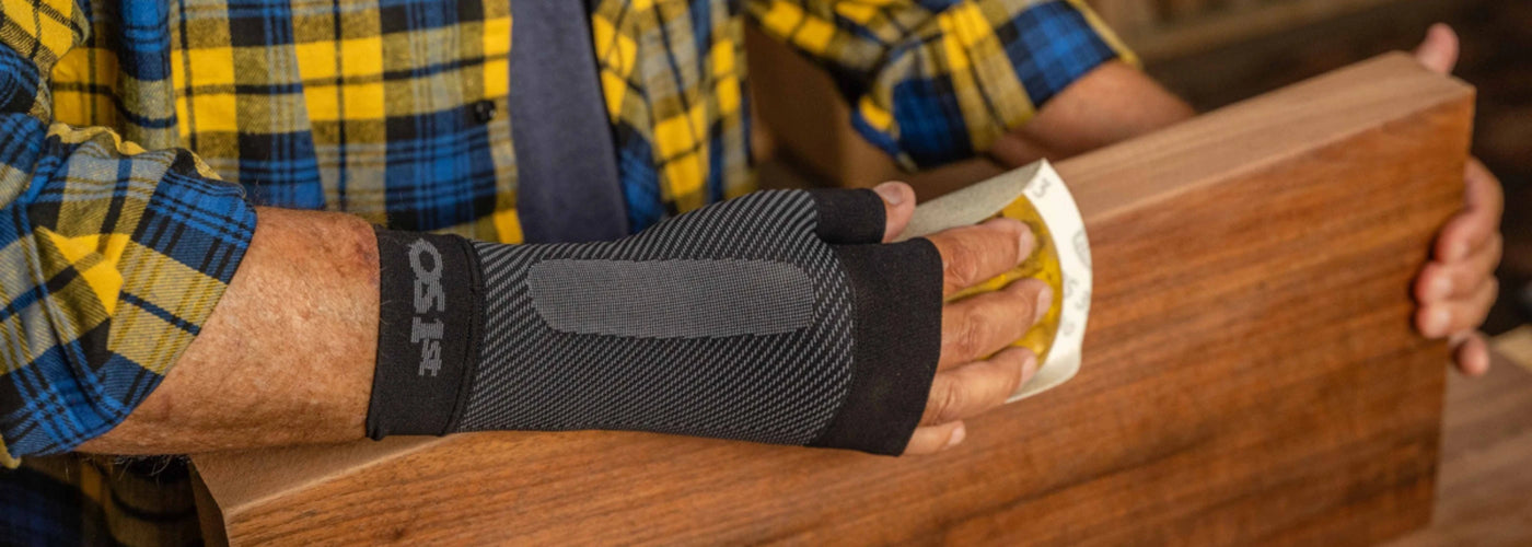 Man wearing the OrthoSleeve Compression Wrist Sleeve