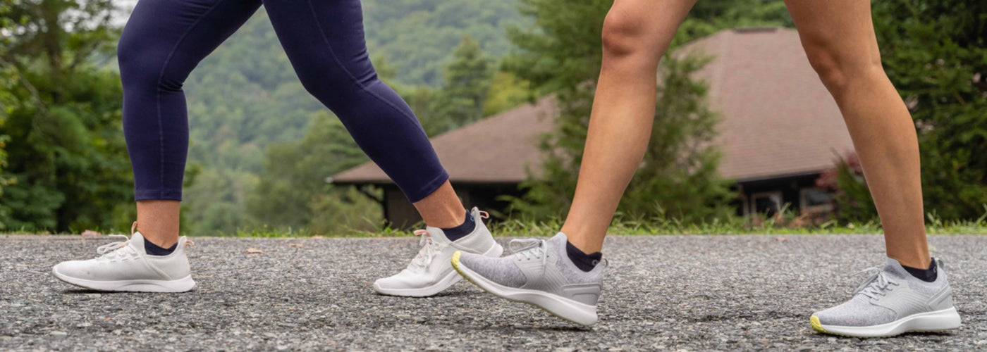 People walking while wearing OrthoSleeve socks
