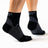 Person wearing the OrthoSleeve black quarter crew length plantar fasciitis socks