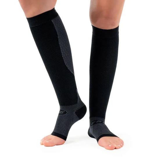 Person wearing the OrthoSleeve FS6+ Leg Sleeves in Black