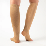 Back view of the OrthoSleeve FS6+ Leg Sleeves in Tan