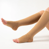 Person wearing the OrthoSleeve FS6+ Leg Sleeves in Tan