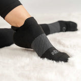 woman wearing black wicked comfort socks, no show/ankle height | OS1st 
