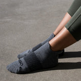 woman wearing charcoal wicked comfort socks, no show/ankle height | OS1st 