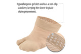An image of the tan FS3 split-toe forefoot sleeve that emphasizes that the hypoallergenic gel dots work as a non-slip stabilizer, keeping the sleeve in place during movement. 