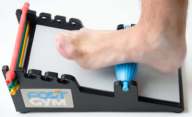 man using the massage on the foot gym