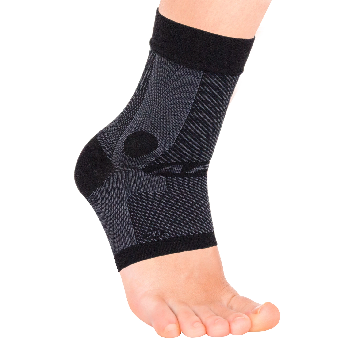 Close up of the black compression ankle sleeve on a model foot