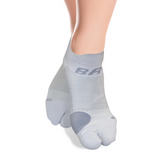 Product image of grey split-toe bunion socks on a woman's feet