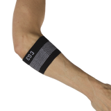Person wearing the compression elbow brace