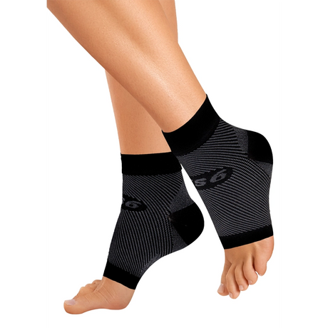 Product photo of black Plantar Fasciitis Sleeves on a woman's feet