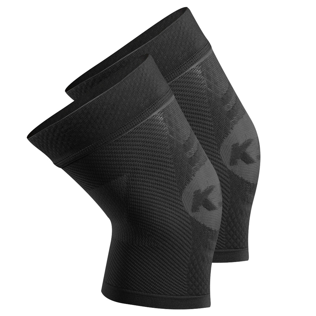 Product image of two, black compression knee sleeves