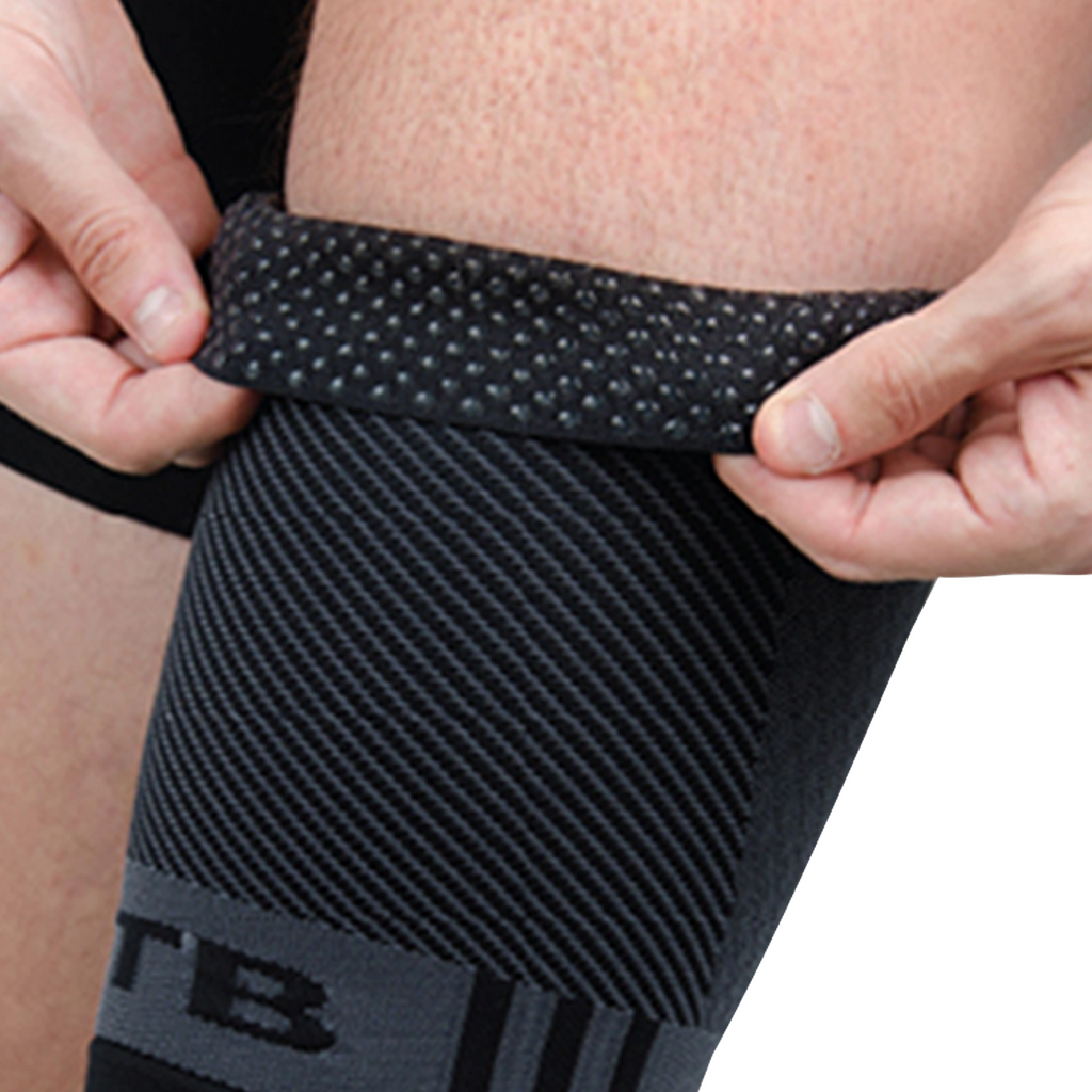 Close up image of silicone gel dots that grip the thigh compression sleeve on your leg while moving