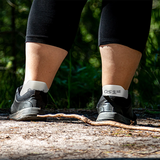 Woman hiking in Diabetic and Neuropathy Non-Binding Wellness Socks in Wide Shoe Sizes