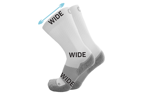 A pair of the wide crew wellness care socks in white